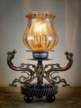Steampunk desk or dresser lamp: small steampunk lamp with Armcarbon filament lamphourglass and and cable dimmer.