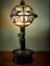 Steampunk Art floor lamp: Decorative piece of art with a Phoenix and Ace of Spades design design.