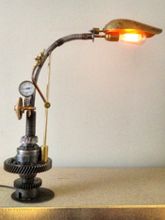 Steampunk  desk or dresser lamp: with Armcarbon filament lamphourglass and and cable dimmer.