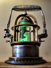 Steampunk Art Alchemy lamp for sale: Decorative piece of art with taxidermy fetus of a kitten.